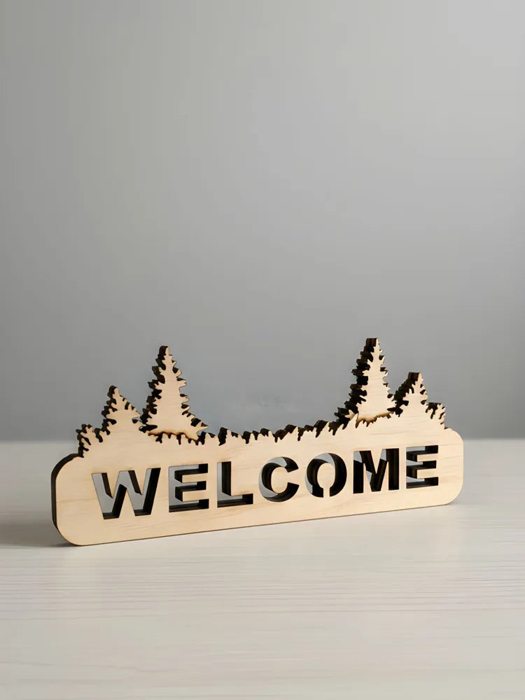 Interior WELCOME sign made of wood with a forest silhouette, decorative plywood panel